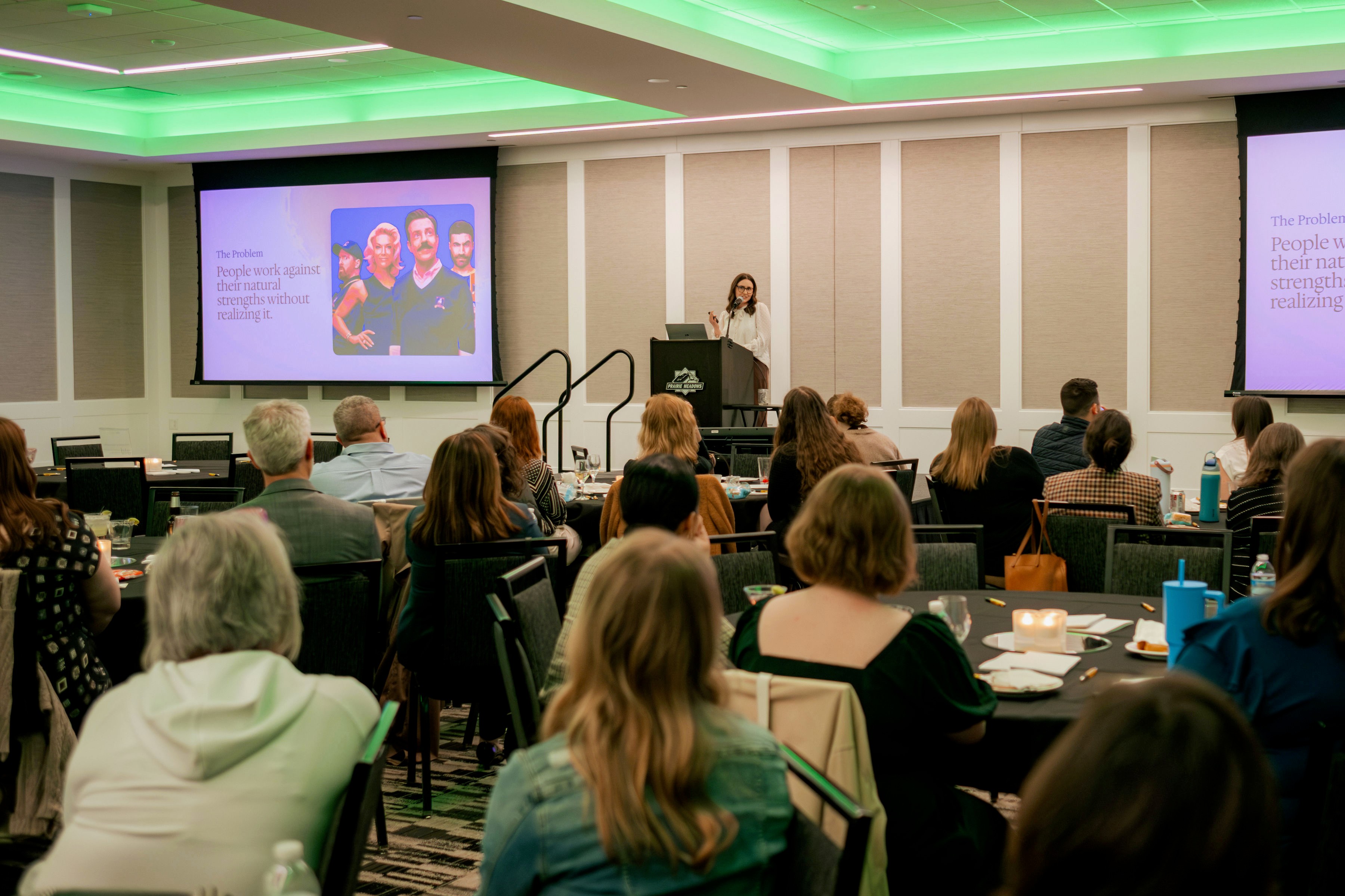 Sara Sladky headshot - woman smiling with brown hair